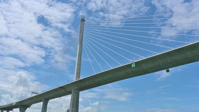Cruising past CCLEX bridge, a large cable-stayed bridge, part of the Cebu&ndash;Cordova Link Expressway.