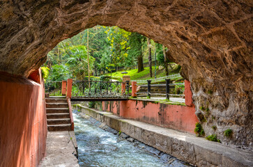 Ayak Suyu hot spring under stone bridge in Termal Kaplicalar park (Yalova, Turkiye)