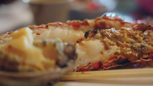 Grilled Japanese Abalone and Spiny Ise Lobsters, Close up of Seaside Barbecue