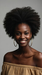 Beauty portrait of african american woman with clean healthy skin on beige background. Smiling beautiful afro girl. Curly black hair