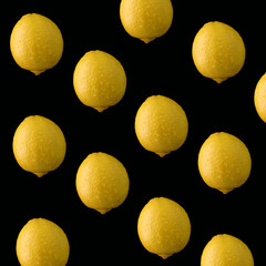yellow lemon on a black background. pattern