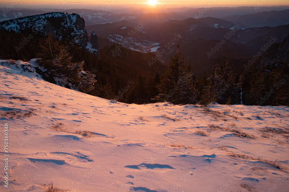 Sticker Beautiful sunrise at winter in Ceahlau Mountains, Romania