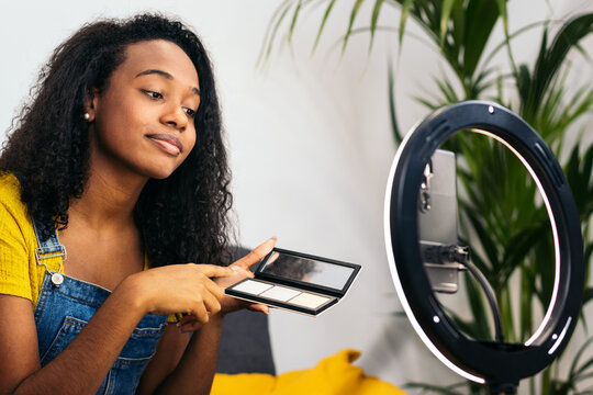 Beauty blogger making the most of technology. - Powered by Adobe