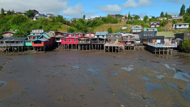 Colorful Castro Stilt Houses, Castro Waterway, Chile Chiloe 4K Aerial Drone Panning