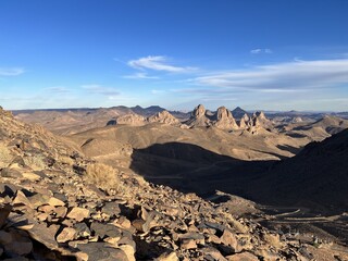Sands and Shadows: Exploring the Enchanting Deserts, Majestic Caves, and Camel Caravans in a Journey Across Arid Landscapes
