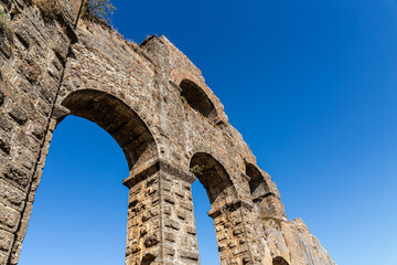 Ruins of roman aqueduct in ancient city Aspendos