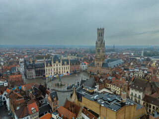 Bruges in Belgium. Birds eye view of the grand place shot with a drone.