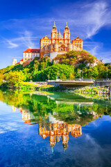 Melk Abbey, Austria. Stift Melk reflected in the water of Danube River, scenic Wachau Valley.