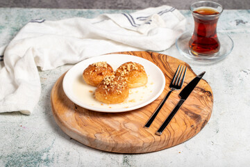 Kemalpasa dessert. Milky dessert. Dessert with hazelnuts, milk and sherbet