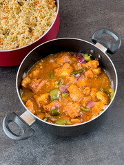 Chinese fried rice and chilly chicken curry Chicken fried rice with vegetables fried eggs basmati grain very popular food in restaurants Kerala Mumbai India Sri Lanka china