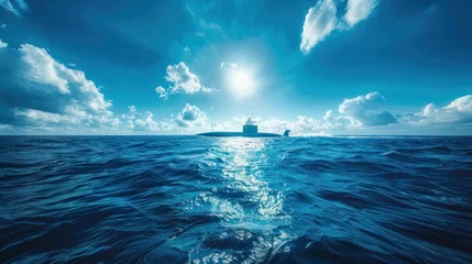 Fotobehang A conventional military nuclear submarine floats in the middle of the ocean while firing an undersea torpedo missile. Wide banner with copy space © sirisakboakaew