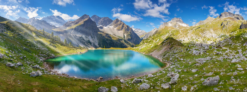 high mountain lake in the alps framed by high mountains, generated image