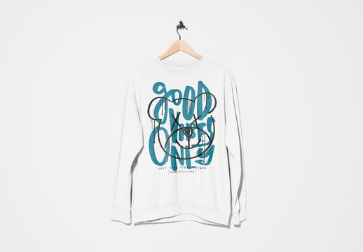 Mockup of customizable sweatshirt on hanger, camera flash