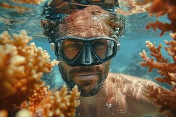  Caucasian man in a mask swims on a coral reef © sofiko14