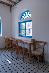 Rattan chairs side the window in a cafe