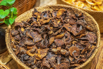 Dried Wild Mushrooms in Natural Wicker Basket