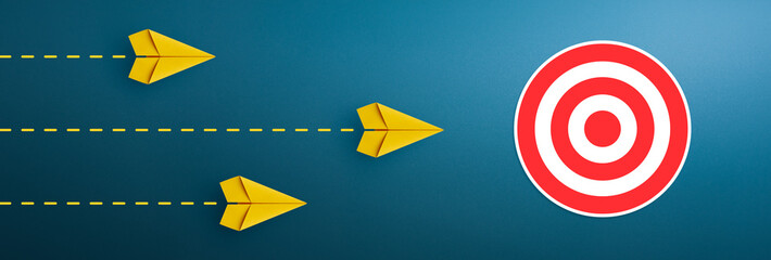 Target concept with yellow paper planes. target icon © Worawut