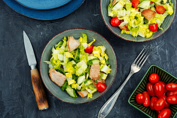 Salad with meat and fresh vegetables.