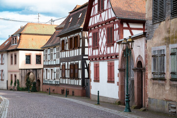 Road in the Alsace in France, Oberbronn with old house, town of storks, timbered houses