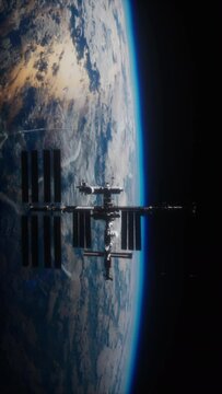 incredible glimpse of the sun-drenched space station observed from a spacecraft revolving around the planet. Elements furnished by NASA, vertical