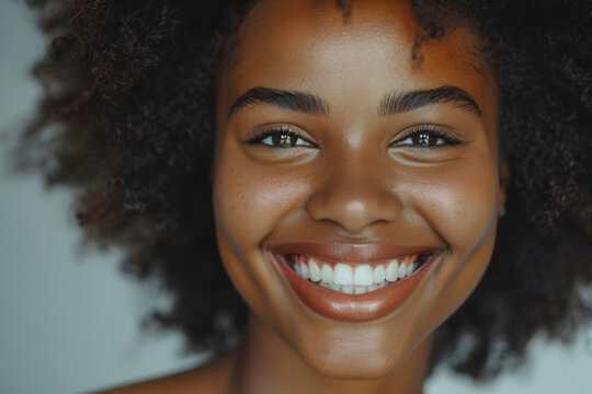 joyful and smiling portrait of african american woman