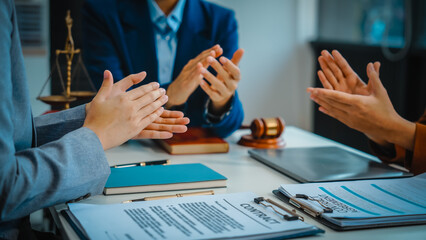 Lawyer team meeting, discussing legal strategies, analyzing cases, and collaborating to provide effective representation. A dynamic exchange of ideas and expertise to navigate complexities of law.
