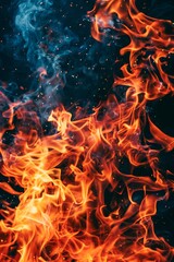 Intense Flames and Sparking Embers Rising in the Dark Night