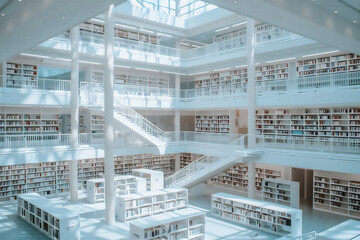 
A very spacious and luxurious and futuristic multi-story library, with lots of shelves filled to capacity, empty space in the middle