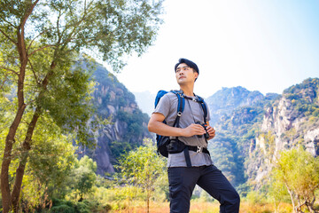 Young man hiking outdoors