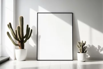 Fotobehang Close up bright modern white room interior background with white blank portrait poster space leaning on white wall background by cactus plant - Mockup © Giuseppe Cammino