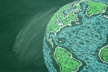 The globe hand drawn in chalk on a school greenboard.