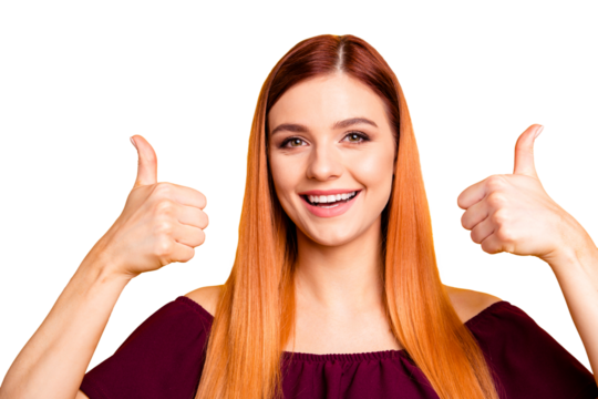 Red straight-haired attractive cute nice young girl showing double thumbs up sing, smiling. Isolated over bright vivid yellow background