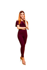 Full body size length photo of red straight-haired attractive cute nice young girl standing touching chin with hand, thoughtful, smiling. Isolated over bright vivid yellow background