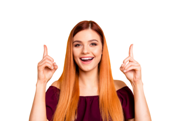 Red straight-haired attractive cute nice young girl showing pointing up with two fingers. Isolated over bright vivid yellow background