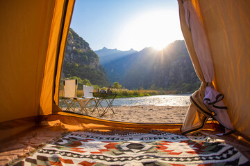 Camping tent by the river