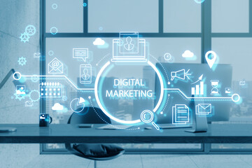 Office workplace with creative glowing marketing hologram on blurry backdrop. Digital online marketing commerce sale concept. Double exposure.