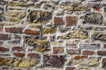 Vintage rustic bricks and stones create the texture of the stone cladding. - 750437980