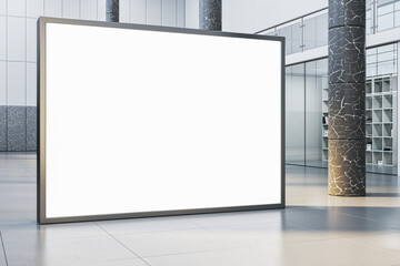 Modern empty white poster in interior with glass partitions, columns and concrete flooring. Mock...
