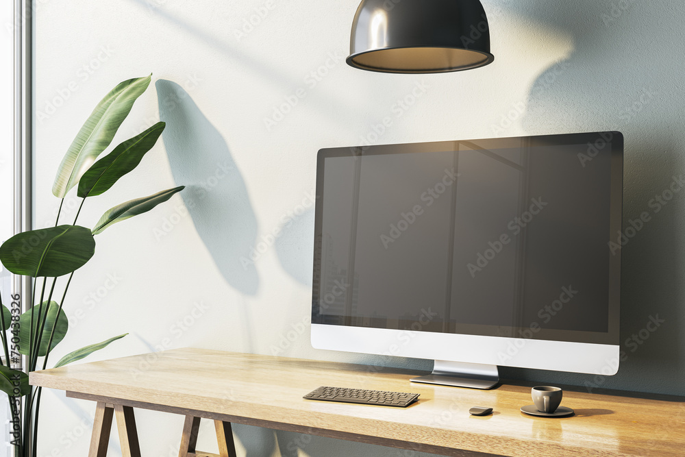 Poster Contemporary home office interior with empty computer monitor on designer desktop. Decorative plant and concrete wall background with shadows. 3D Rendering.