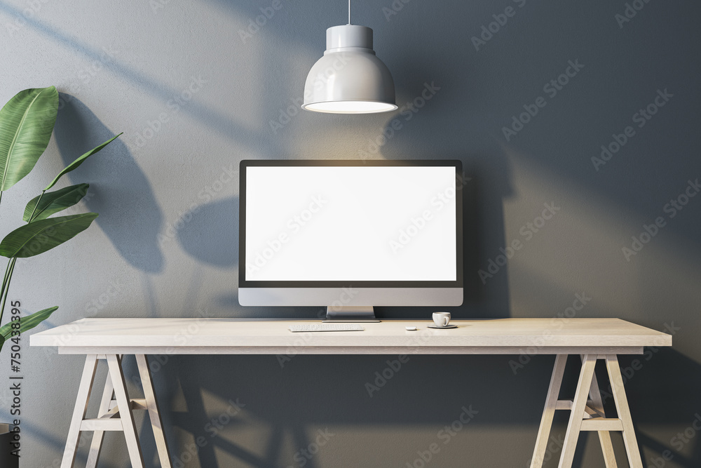 Poster modern home office interior with empty white computer monitor on designer desktop. concrete wall bac