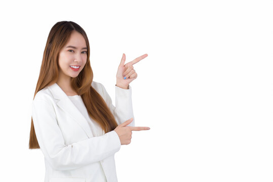 Portrait Asian professional young business woman is smiling confidently and shows her hands to present good symbol while isolated white background.