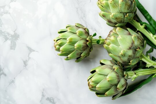 Fresh raw organic farm one artichoke on white marble background top view, healthy artichokes in balanced nutrition and cooking concept 