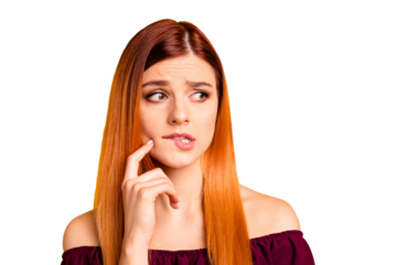 Close up portrait of frustrated confused girl bite her lip and touch cheek by finger isolated on yellow background