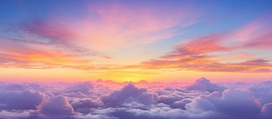 Naklejka na ściany i meble Mesmerizing Sunset Views from High in the Sky with Beautiful Orange and Purple Hues