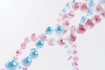 A strand of pink, blue, and white beads. Ideal for jewelry making projects