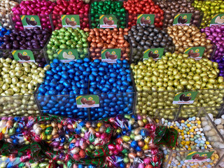 Easter egg’s, Display with small chocolate Easter eggs wrapped in colored silver paper