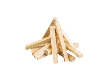Dry slim firewood chopped and stacked on white background