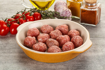 Uncooked raw beef meatball minced