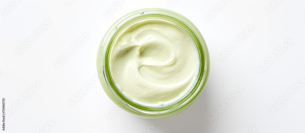 Sticker eco-friendly beauty product: green cream jar on clean white surface with copy space