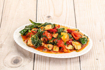 Chicken with tomato and spinach
